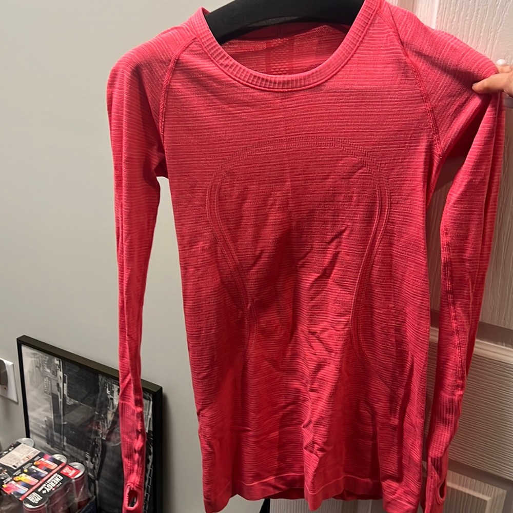 Women’s size small pink striped Lululemon Swiftly Tech long sleeve shirt
